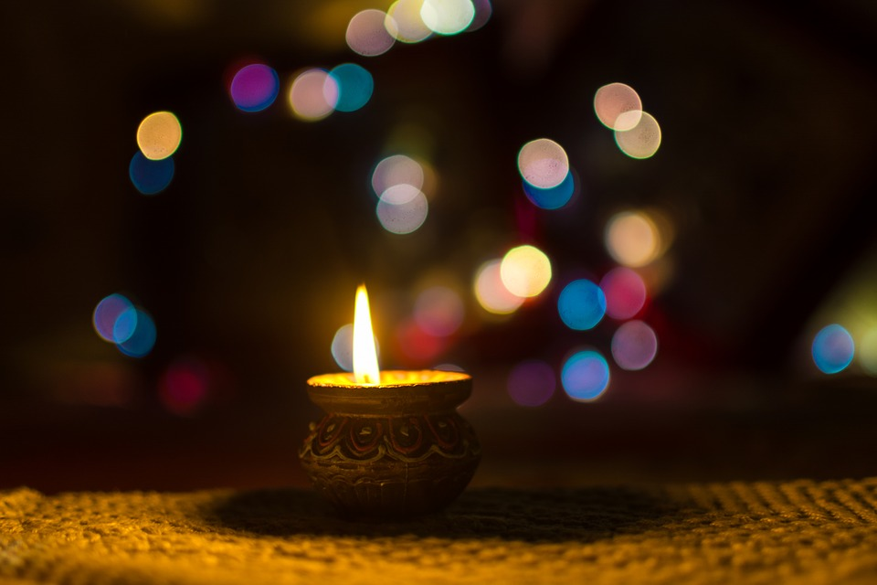 Use the diyas to decorate the space