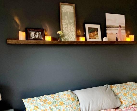 Install a long headboard floating shelf